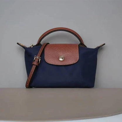 Calo compacte mini-handtas, crossbodytas voor dagelijkse benodigdheden