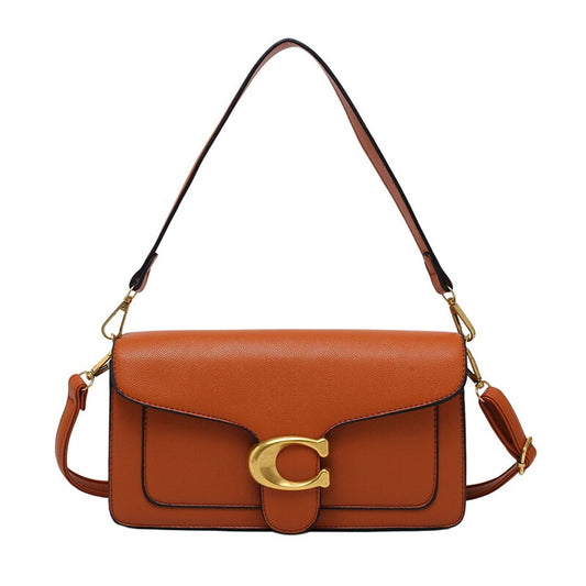 Luxus-Handtasche aus veganem Leder mit goldfarbenen und braunen Details