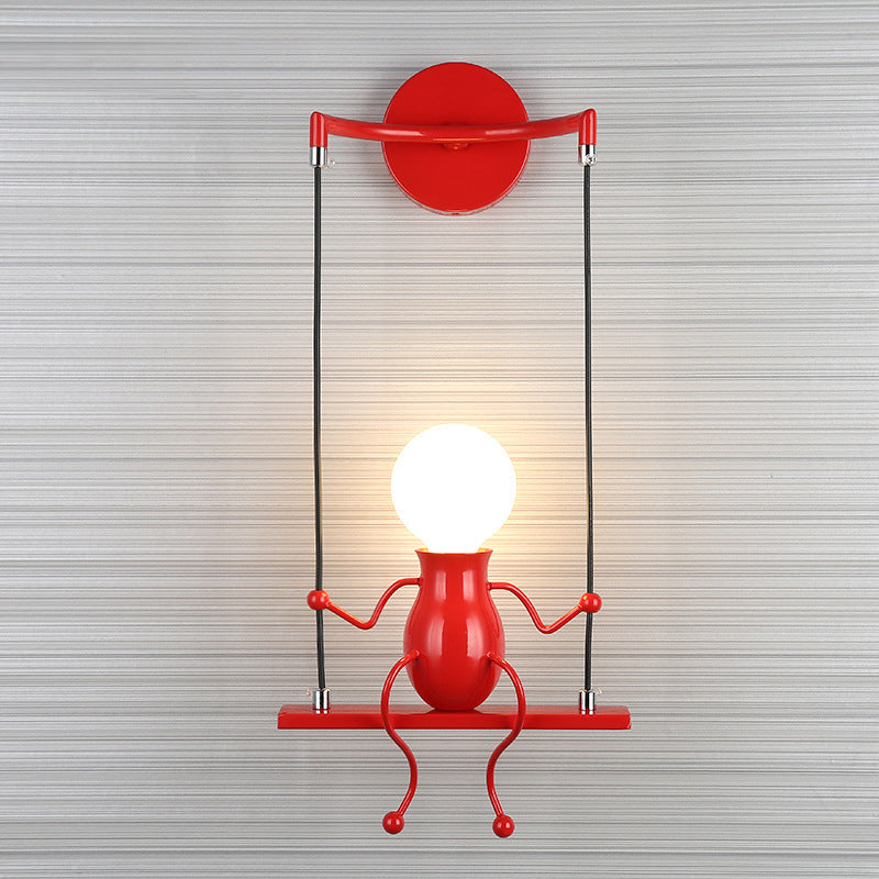 SwingDesign moderne Wandleuchte mit verspielter Figur